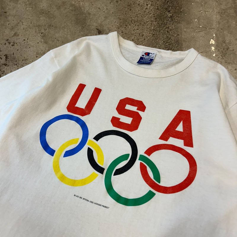 古着【Champion】オリンピックデザインTシャツ